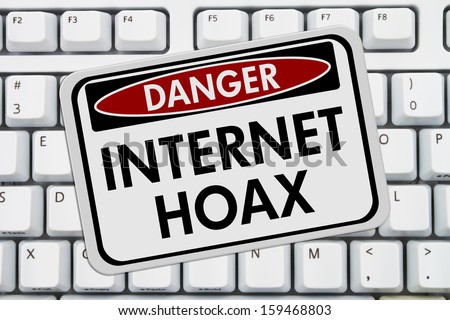 Computer keyboard keys with danger sign with words Internet Hoax, Danger of Internet Hoax