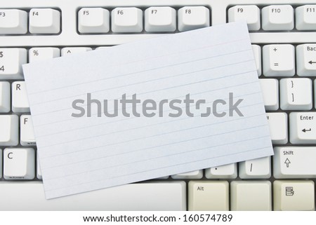 Computer keyboard keys with blank index card with copy space, Create your own online message