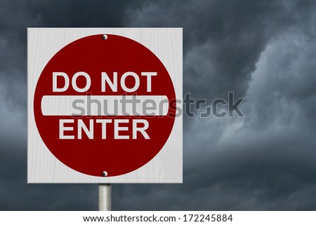 Do Not Enter Sign, A Square American road warning sign with words Do Not Enter with stormy sky