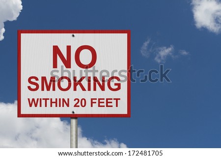 No Smoking Sign, A white American road sign with words No Smoking within 20 feet with sky background