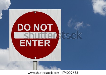 Do Not Enter Sign, A Square American road warning sign with words Do Not Enter with blue sky