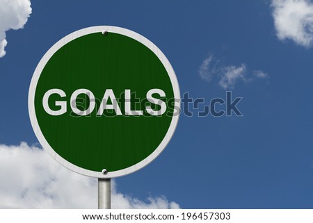 Goals Sign, An green road sign with text Goals with sky background