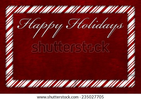 A Happy Holidays card, A Candy Cane border with words Happy Holidays over red plush background with copy-space