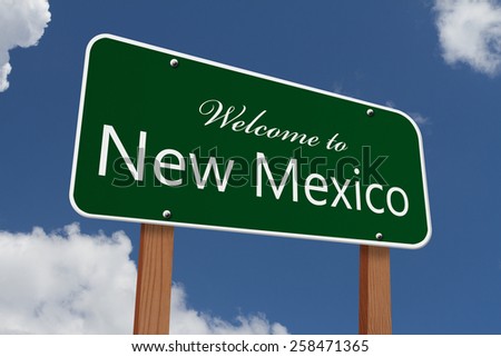 Welcome to New Mexico Road Sign, Green highway sign with words Welcome to New Mexico with sky background