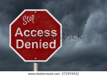 Stop Access Denied Road Sign, Stop sign with words stop Access Denied with a stormy sky background