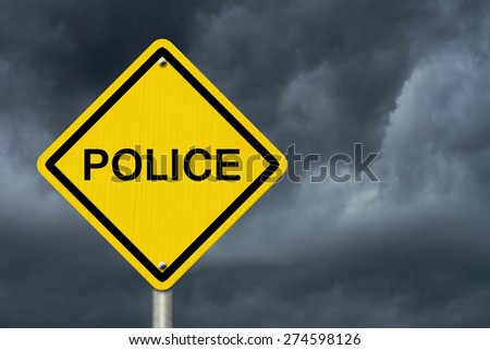 Police Caution Road Sign, Caution sign with word Police with stormy sky background