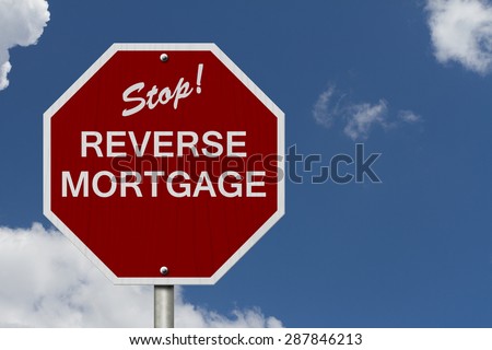 Stop Reverse Mortgage Road Sign, Stop sign with words Reverse Mortgage with sky background
