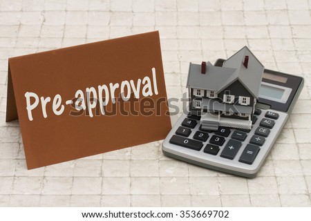 Home Mortgage Pre-approval, A gray house, brown card and calculator on stone background with text  Pre-approval