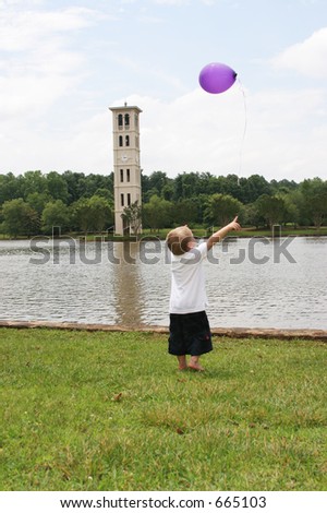 boy with purple balloon
