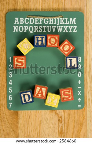 school days on a chalk board with alphabet and numbers