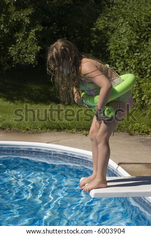 Child about to jump from diving board