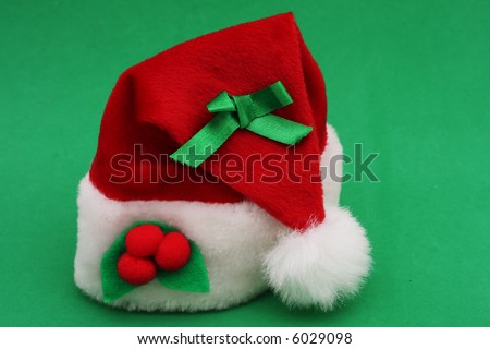Santa Claus hat on green background