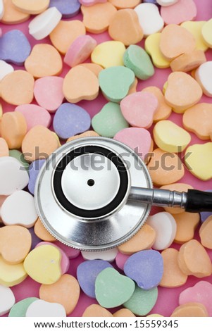 Stethoscope with candy hearts â?? listening to what your heart is saying