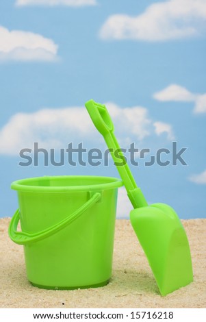 Shovel and bucket in sand â?? summer time fun