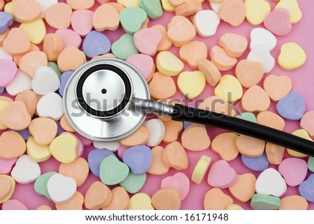 Stethoscope with candy hearts â?? listening to what your heart is saying