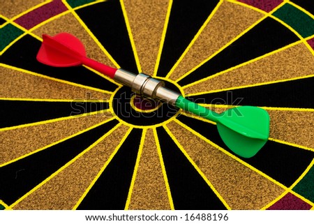 Magnetic dart board with darts, both are on target