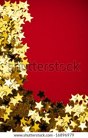 Gold stars making a border on red background, gold star border