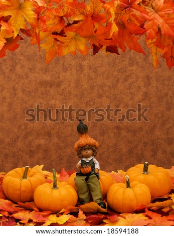 Lots of pumpkins sitting together with a boy sitting on one, pumpkin patch