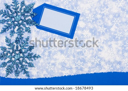 Blank card on blue snowflake background, happy holidays