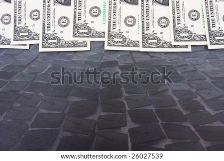 One dollar bills sitting on a graduation hat background, dollar bill border
