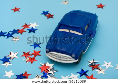 An older car and colourful stars on a blue background, American bailout car money