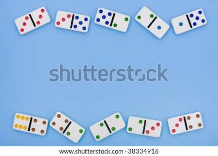 A border made of dominoes sitting on a blue background, domino border