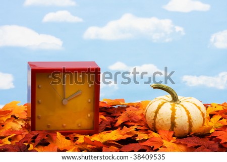 Fall coloured leaves making a border on a sky background, Fall Leaves