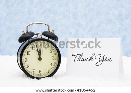 A retro clock with a thank you card snowflake background, thank you