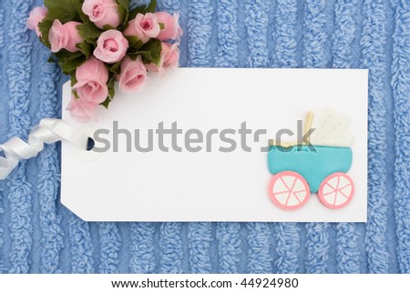A blank gift tag with a blue background, baby gift