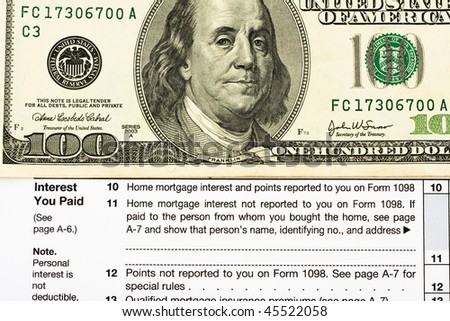 One hundred dollar bills sitting on tax papers, Federal Tax Forms for Items Deductions