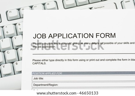 A job application jobs sitting on a computer keyboard, apply for jobs online
