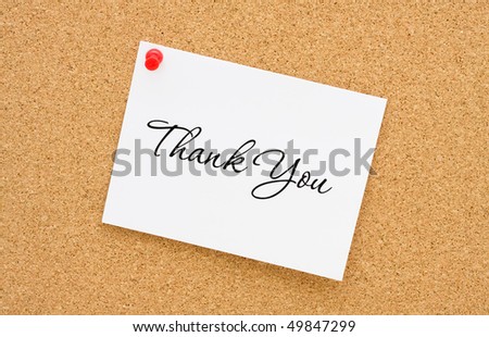 A thank you note tacked to a corkboard, thank you note