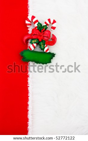 A candy cane with a ribbon border on a white background