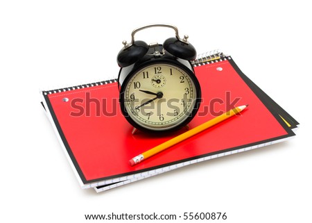 An old fashioned clock on a books isolated on a white background, Time to go back to school