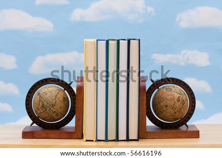 A stack of book between book end with a sky background, International education
