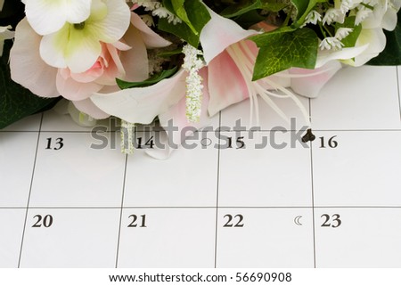 A bouquet of flowers with a calendar background, Giving Flowers