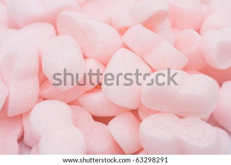 Close-up of pink packaging materials, Styrofoam peanuts