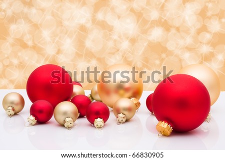 Red and gold christmas balls on a gold background, Christmas time
