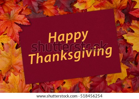 Happy Thanksgiving Greeting Card, Some fall leaves and a greeting card with text Happy Thanksgiving