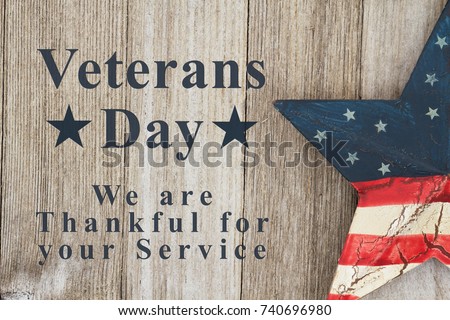 Veterans Day we are thankful for your service text with USA patriotic old star on a weathered wood