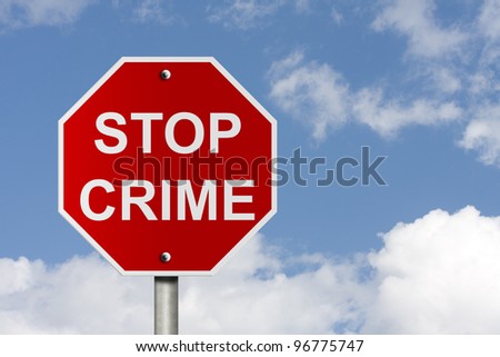 An American road stop sign with clouds with words stop crime, Stopping Crime