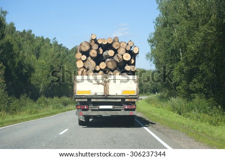 Transporting wood.
