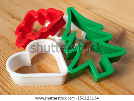 Christmas cookie cutters  on the pastry board