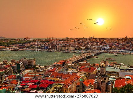 Panoramic Golden Horn sunset view with Blue Mosque and Hagia Sophia from Galata tower, Istanbul, Turkey