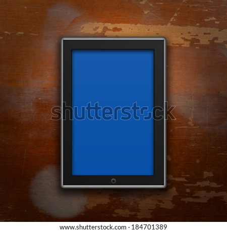 touch pad on a wooden background