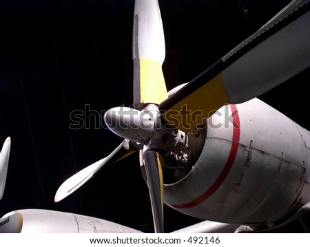 Propeller aircraft engine.  Powerful piston engines drive large propellers on this vintage aircraft.