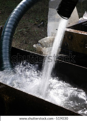 Discharge, High Volume Water Pump. Cleanup after natural disaster.