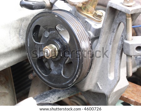 Components of an automobile engine, pump pulley