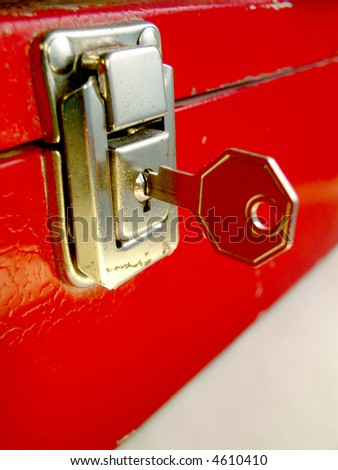 A locked cash box is a perfect icon for internet sales, orders, security etc. RED, MONEY, and SECRET guarentee eye pull! shallow depth of field