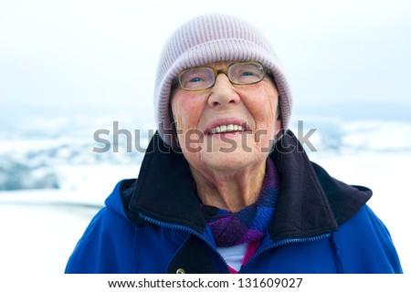 senior in front of winter- background